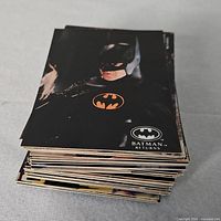 Stack of Batman Returns cards with Batman on top
