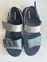 Top view of both sandals showing straps, branding on footbed