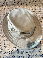 Full view of hat top and brim showing color and condition