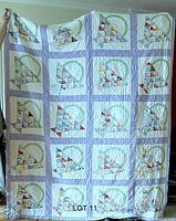full view of quilt showing overall flower basket layout and lavender sashing