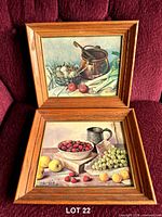 Both framed prints displayed together