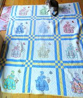 Full view of the quilt showing overall pattern, sashing, and scale
