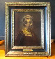 Full view of framed Rembrandt print with title plaque