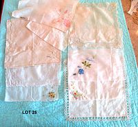 Group shot of all handkerchiefs laid out on quilt