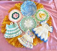 Group shot of all seven crocheted pieces