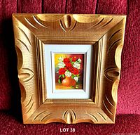 Front view of framed floral oil painting