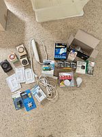 Group shot of all electrical and lighting items on floor
