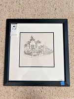 Full view of framed print with black frame and mat