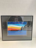 Front view of framed landscape print