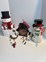 Group view of six snowman decorations