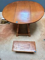 Top view of table and footstool showing overall design and scale