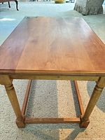 Full view of rectangular wood end table top and legs