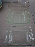 Nested glass baking dishes showing three of five pieces