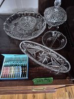 Group shot of all glass pieces and boxed forks