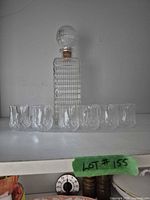 Full set showing decanter with stopper and six shot glasses