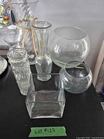 Group shot of all six clear glass vessels