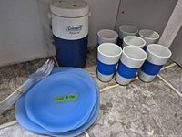 Full set showing jug, mugs, plates, utensils