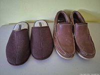 Florsheim slip-ons and Wild River slippers side by side
