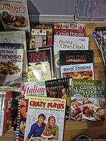 Front view showing majority of cookbooks and magazines laid out
