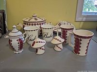 Front view of all ceramic pieces displaying decoration and forms