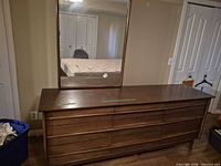 Front view of dresser with attached mirror