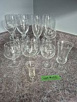 Group shot of all thirteen glasses on countertop