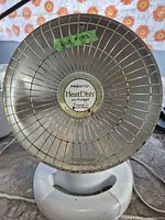 Full view of Presto HeatDish plus Footlight heater showing base and grill