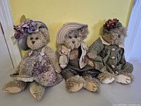 Three dressed Bearington teddy bears lined up