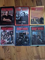 All six Sopranos DVD boxed sets laid out on floor