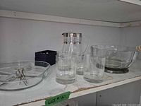 Entire set on shelf: pitcher, tumblers, serving bowl, divided dish, napkin rings