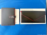 Wallet clutch and passport holder on Lodis boxes
