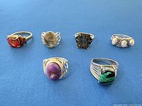 Front view of all six rings showing stone colours and styles