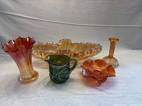 Group shot of all five coloured glass pieces