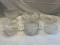Group shot of all six pressed glass pieces