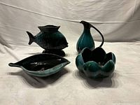 Group shot of four Canadian pottery pieces