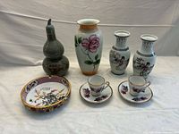 Group shot of all eight porcelain pieces