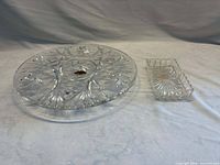 Round lead crystal cake plate and rectangular divided dish side by side