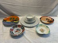 Group of six porcelain pieces including Imperial China stack and four hand-painted items