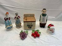 Group shot of all seven porcelain and ceramic items