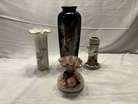 Group shot of all four Japanese porcelain vases