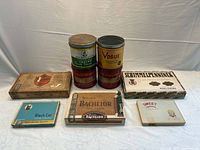 Group shot of all nine tobacciana items