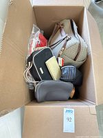 Overview of assorted bags inside shipping box