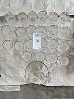 Top view showing twenty stemmed glasses arranged plus serving bowl