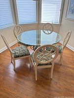 Entire dining set showing table and four of five chairs