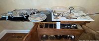Overview of all serveware and flatware in lot