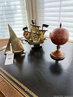 All three nautical decor pieces grouped on tabletop