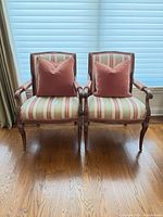 Front view of both armchairs with pillows