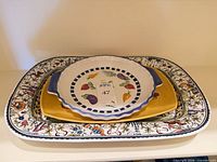 Stacked platters and pie dish
