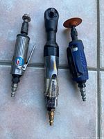 Front view of all three pneumatic tools