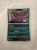 Front of Gengar holofoil rare card displaying set number 050/088, ability, attack and HP